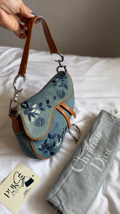Authentic Vintage Christian Dior Light Blue Denim Saddle Shoulder Bag w/ Embroidered Floral & Butterfly Motifs