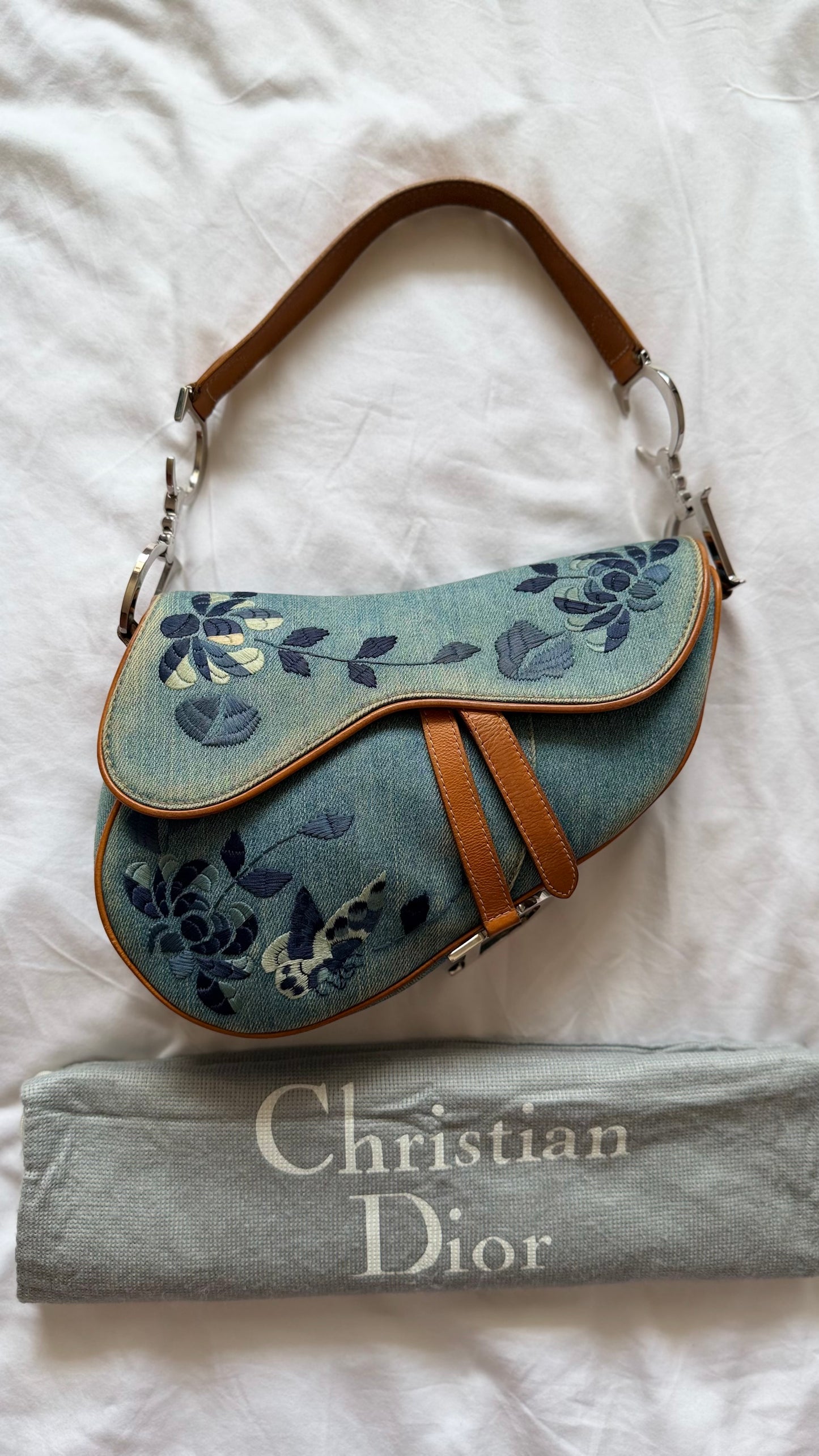 Authentic Vintage Christian Dior Light Blue Denim Saddle Shoulder Bag w/ Embroidered Floral & Butterfly Motifs