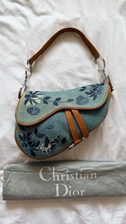 Authentic Vintage Christian Dior Light Blue Denim Saddle Shoulder Bag w/ Embroidered Floral & Butterfly Motifs