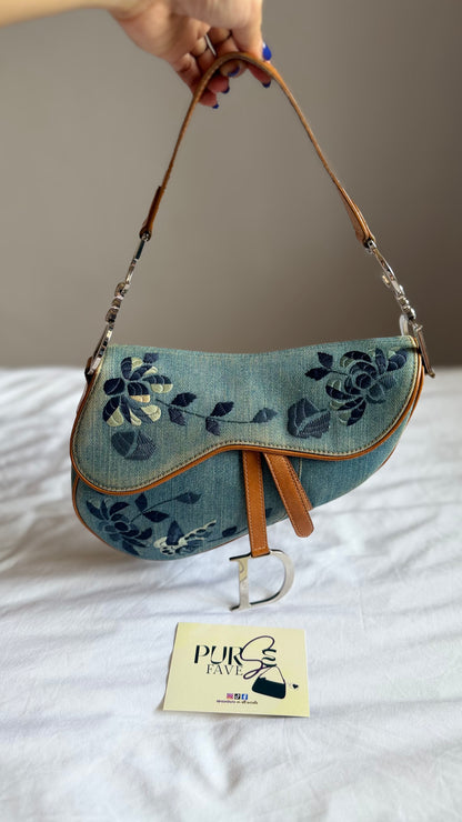 Authentic Vintage Christian Dior Light Blue Denim Saddle Shoulder Bag w/ Embroidered Floral & Butterfly Motifs