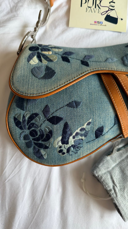 Authentic Vintage Christian Dior Light Blue Denim Saddle Shoulder Bag w/ Embroidered Floral & Butterfly Motifs