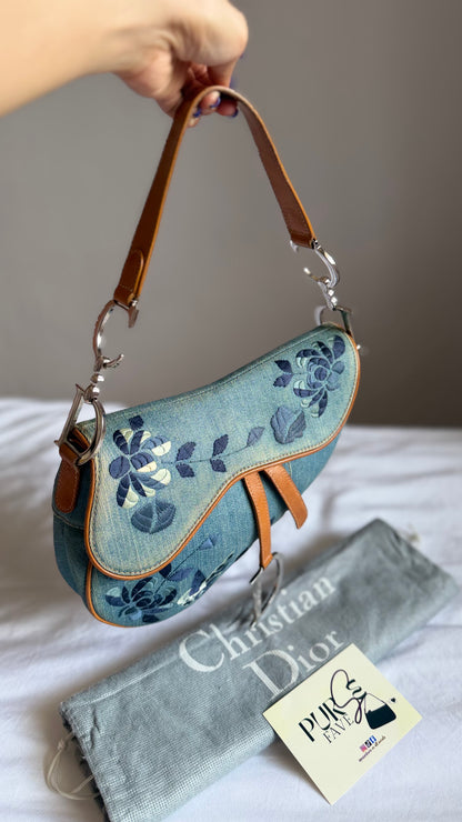 Authentic Vintage Christian Dior Light Blue Denim Saddle Shoulder Bag w/ Embroidered Floral & Butterfly Motifs