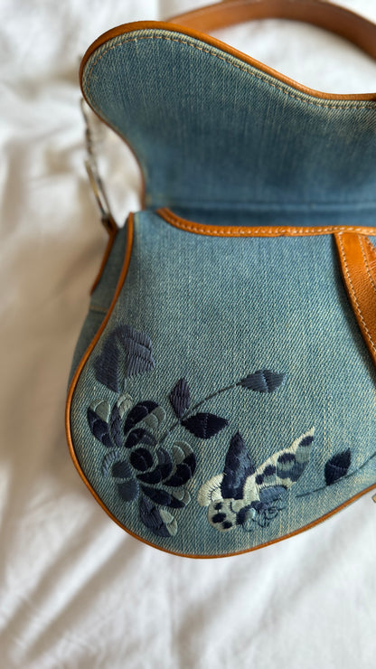 Authentic Vintage Christian Dior Light Blue Denim Saddle Shoulder Bag w/ Embroidered Floral & Butterfly Motifs