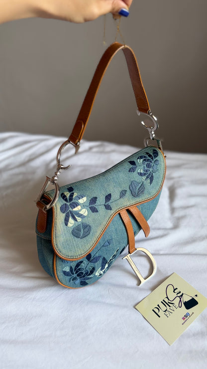 Authentic Vintage Christian Dior Light Blue Denim Saddle Shoulder Bag w/ Embroidered Floral & Butterfly Motifs